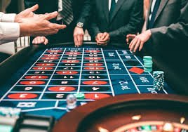 Live Baccarat dealer in studio with multi-camera setup